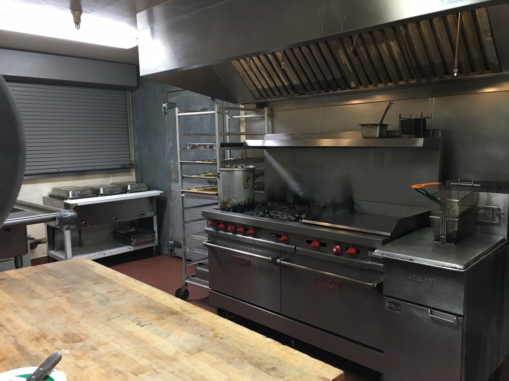The kitchen as it looks now. Our heroic cooks provide meals for the whole house and commissary for another facility from this overworked space.